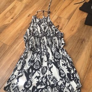 Cute open back romper.